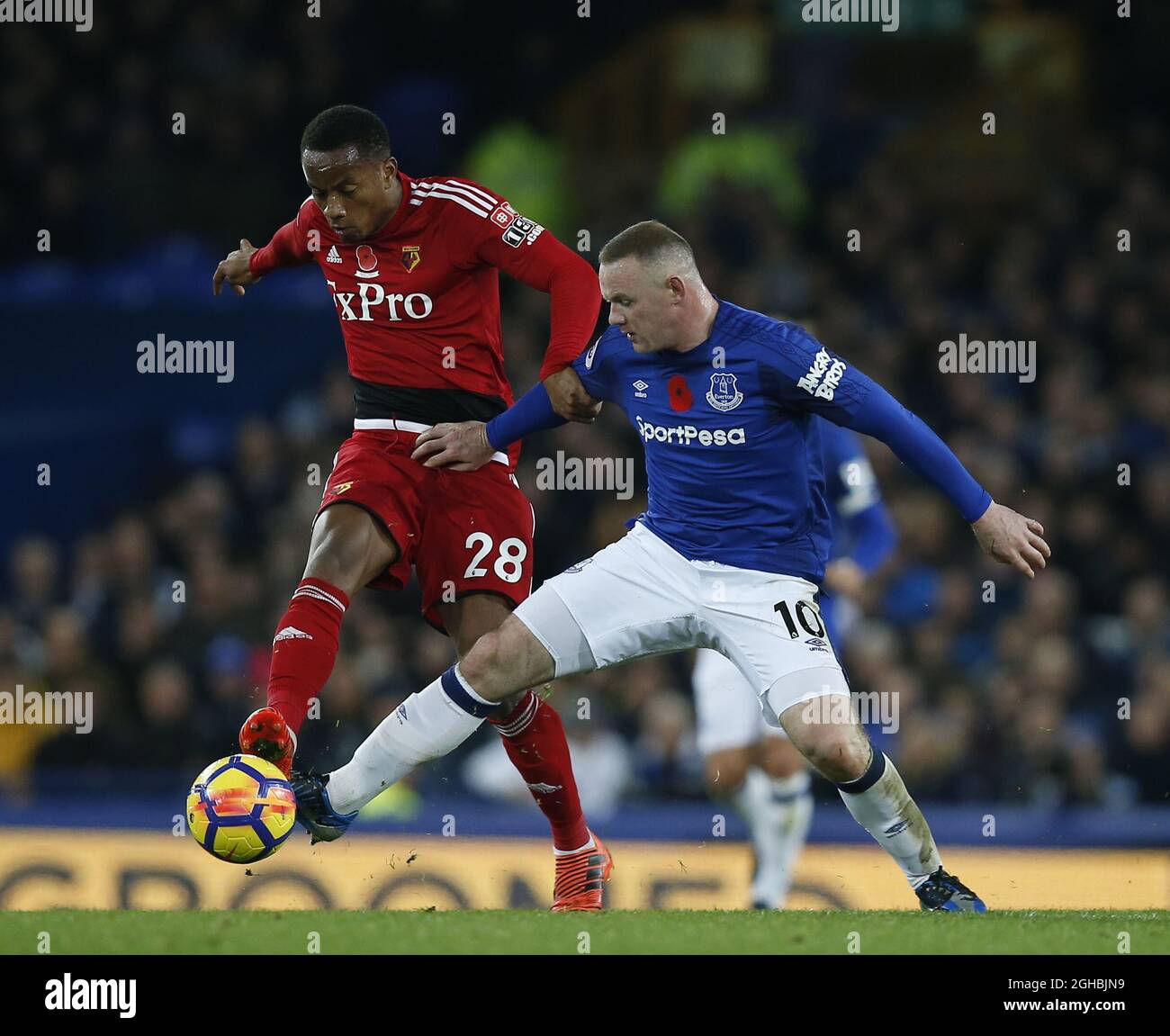 Andre Carrillo of Watford tackled by Wayne Rooney of Everton during the premier league match at Goodison Park  Stadium, Liverpool. Picture date: 5th November 2017. Picture credit should read: Andrew Yates/Sportimage via PA Images Stock Photo