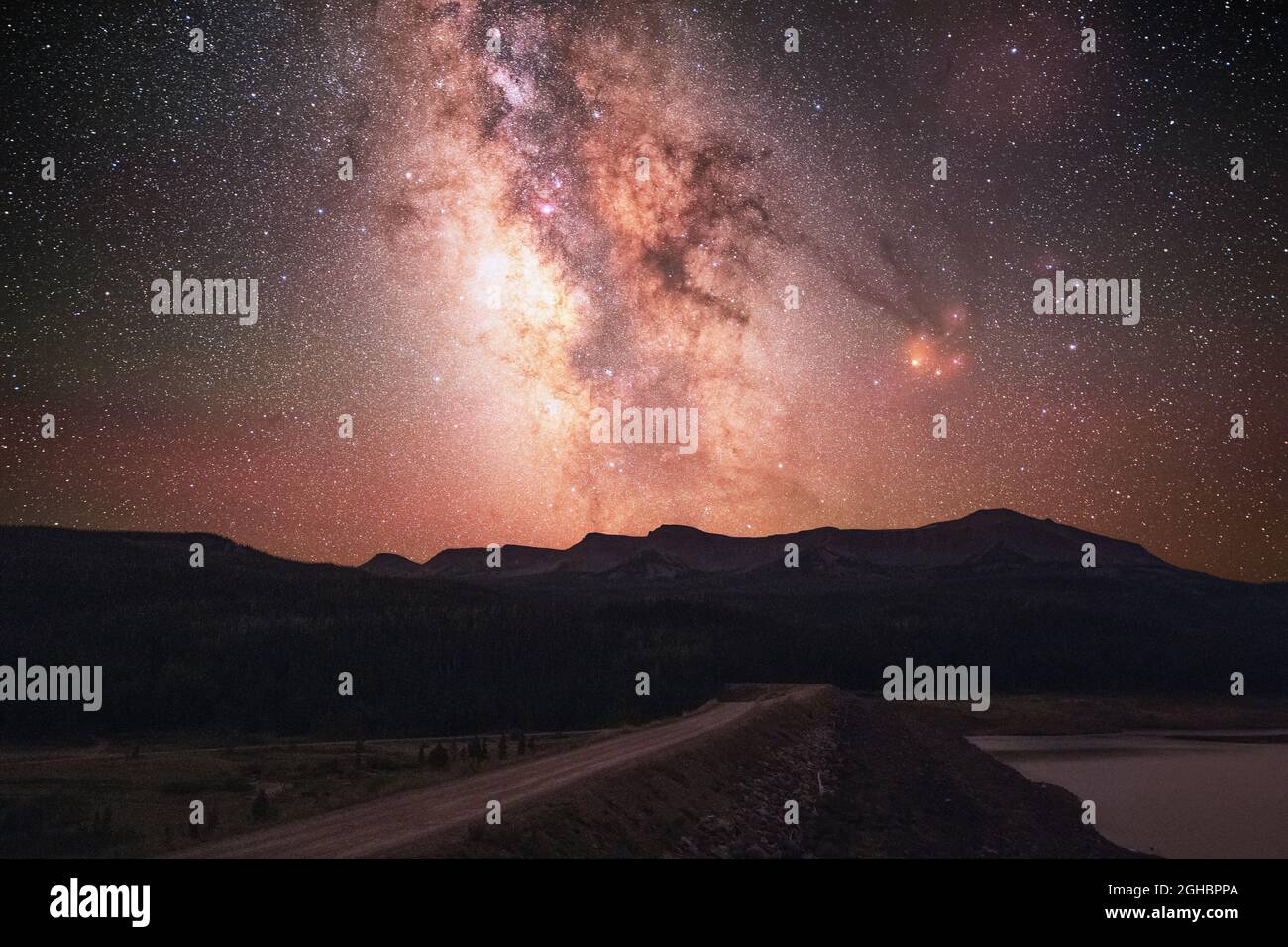 Our milky way galaxy as seen above the flattop mountains in northwest colorado.  Image was taken from a parking lot in the flat tops wilderness area. Stock Photo