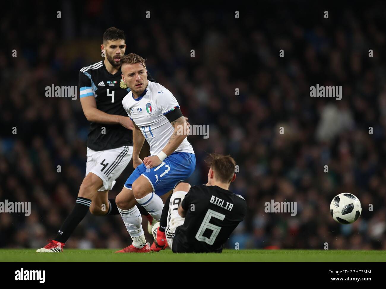 Ciro Immobile of Italy tackled by Lucas Biglia of Argentina during the International Friendly match at the Etihad Stadium, Manchester. Picture date: 23rd March 2018. Picture credit should read: Simon Bellis/Sportimage via PA Images Stock Photo