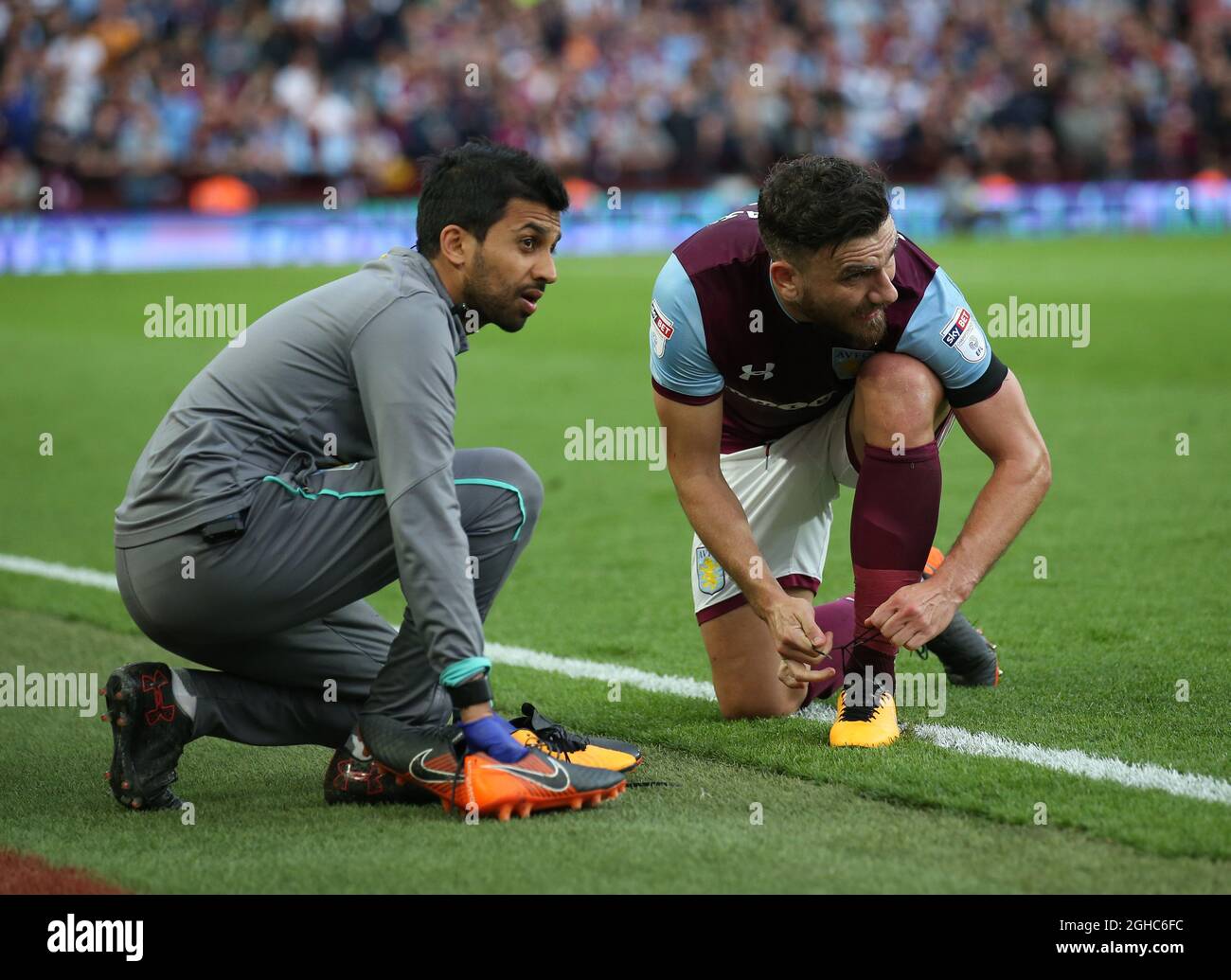 Robert Snodgrass of Aston Villa changes his right boot only during the championship play-off 2nd leg match at Villa Park Stadium, Birmingham. Picture date 15th May 2018. Picture credit should read: Simon Bellis/Sportimage via PA Images Stock Photo