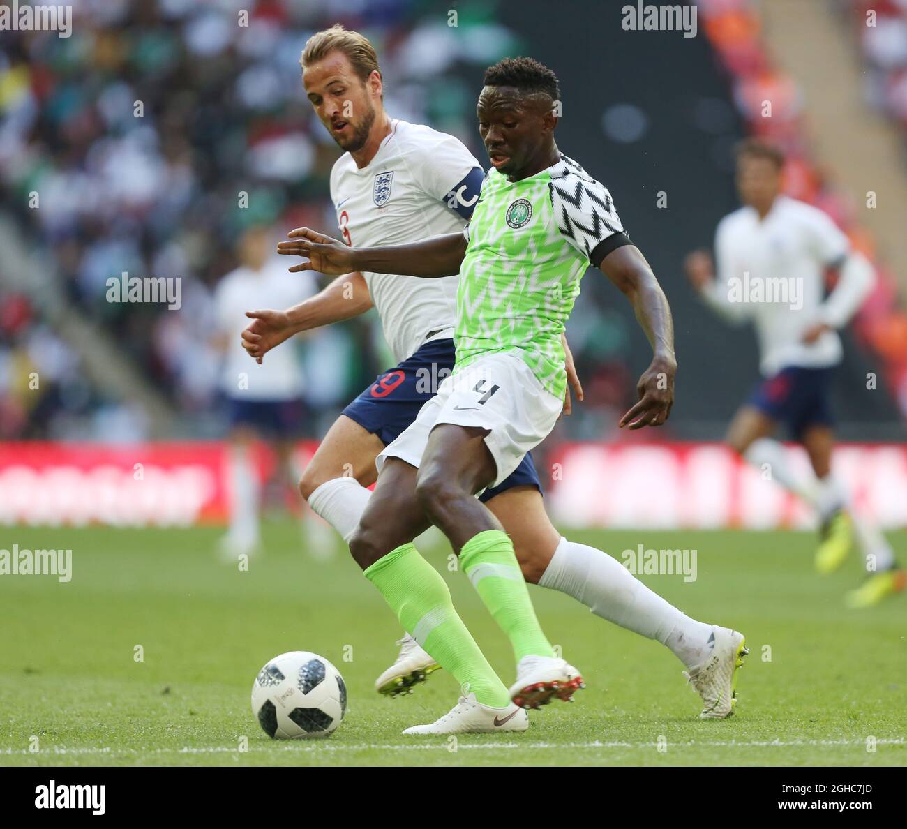Kenneth Omeruo of Nigeria takes on Harry Kane of England during the International Friendly match at  Wembley Stadium, London. Picture date 2nd June 2018. Picture credit should read: David Pinegar/Sportimage via PA Images Stock Photo