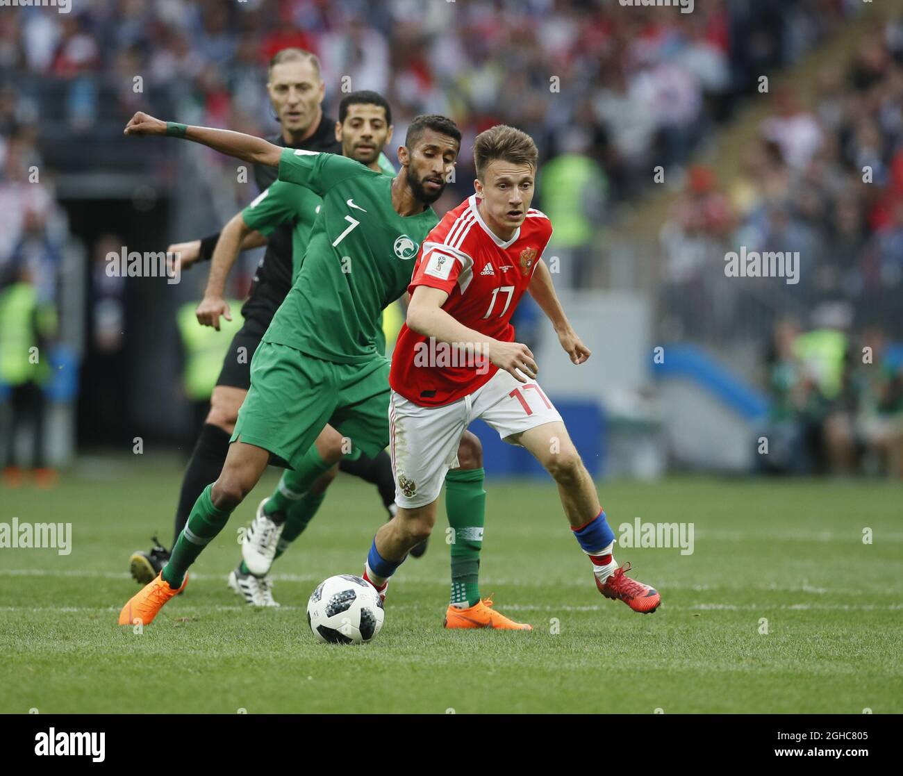 Alfaraj Mohammed of Saudi Arabia is left by Aleksandr Samedov of Russia during the FIFA World Cup 2018 Group A match at the Luzhniki Stadium, Moscow. Picture date 14th June 2018. Picture credit should read: David Klein/Sportimage via PA Images Stock Photo