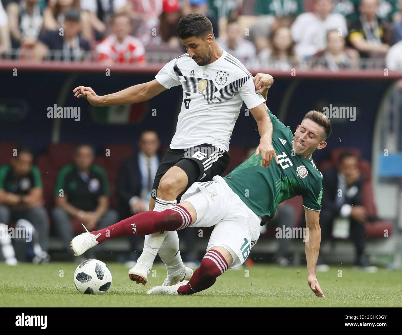 Sami Khedira of Germany tackled by Hector Herrera of Mexico during the FIFA World Cup 2018 Group F match at the Luzhniki Stadium, Moscow. Picture date 17th June 2018. Picture credit should read: David Klein/Sportimage via PA Images Stock Photo