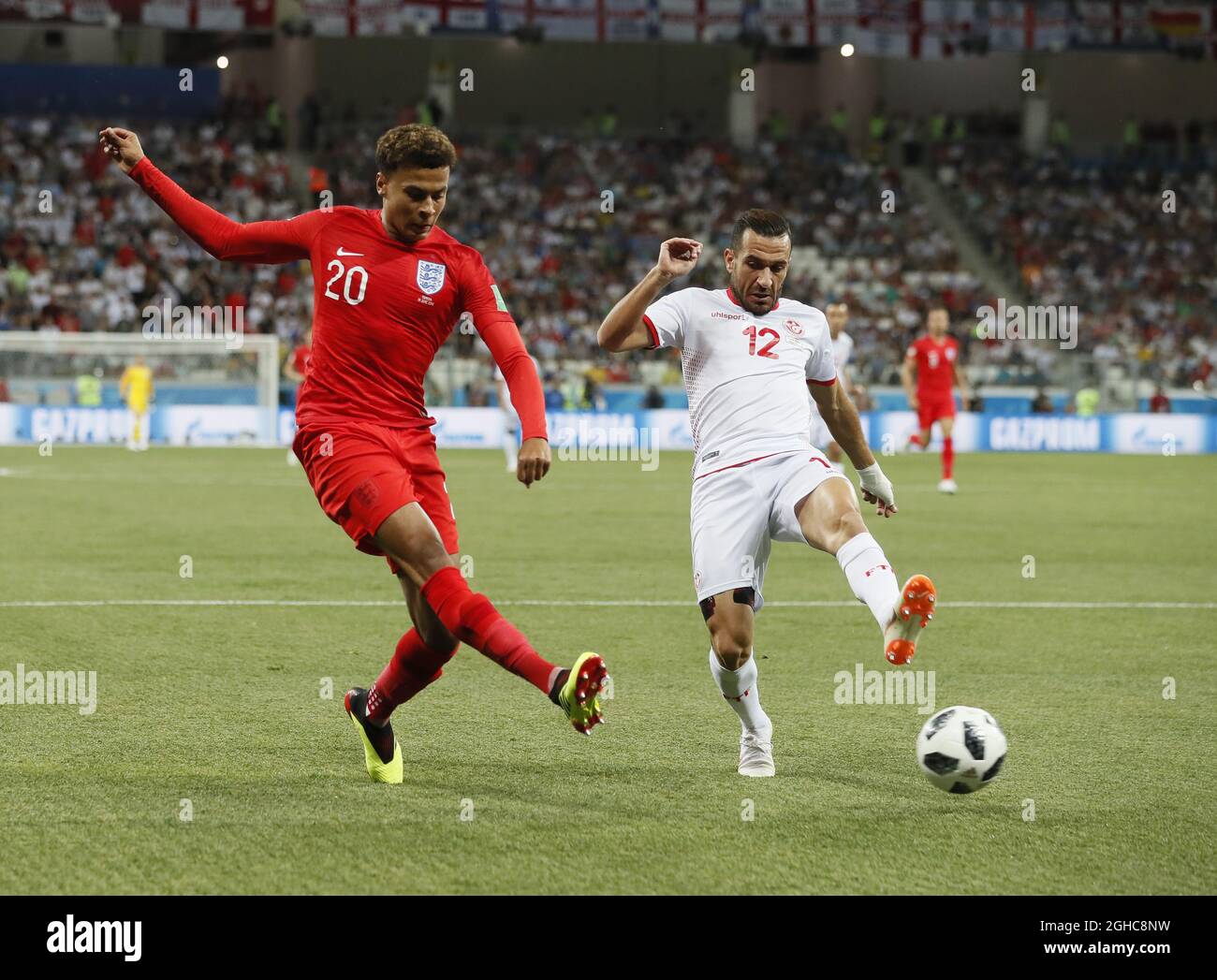 Dele Alli of England shoots past Ali Maaloul of Tunisia during the FIFA World Cup 2018 Group G match at the Volgograd Arena, Volgograd. Picture date 18th June 2018. Picture credit should read: David Klein/Sportimage via PA Images Stock Photo