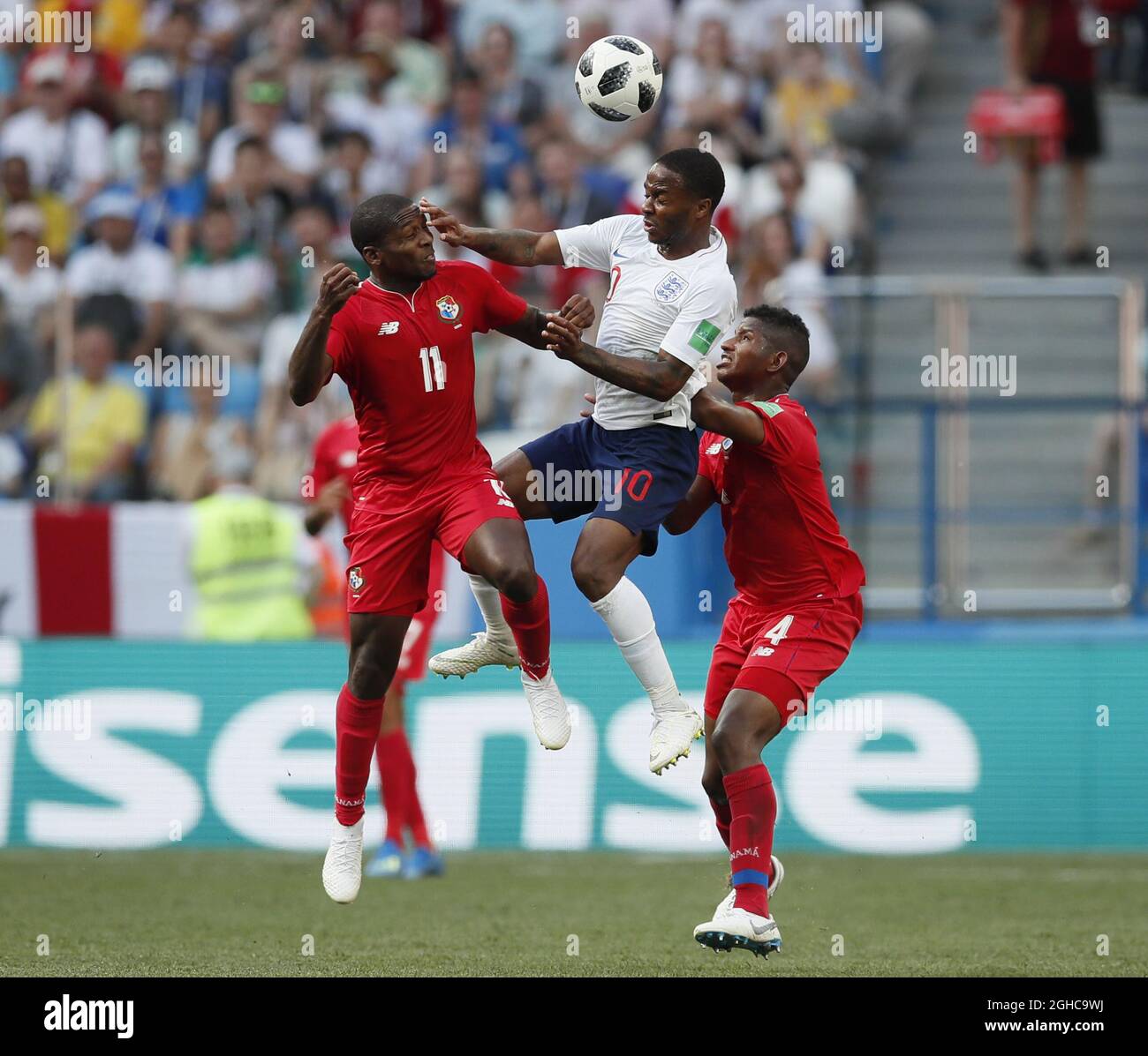 Raheem Sterling of England tussles with Armando Cooper of Panama during the FIFA World Cup 2018 Group G match at the Nizhny Novgorod Stadium, Nizhny Novgorod. Picture date 24th June 2018. Picture credit should read: David Klein/Sportimage via PA Images Stock Photo