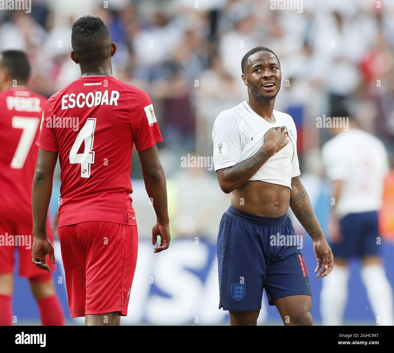 Raheem Sterling of England glares at Fidel Escobar of Panama during the FIFA World Cup 2018 Group G match at the Nizhny Novgorod Stadium, Nizhny Novgorod. Picture date 24th June 2018. Picture credit should read: David Klein/Sportimage via PA Images Stock Photo