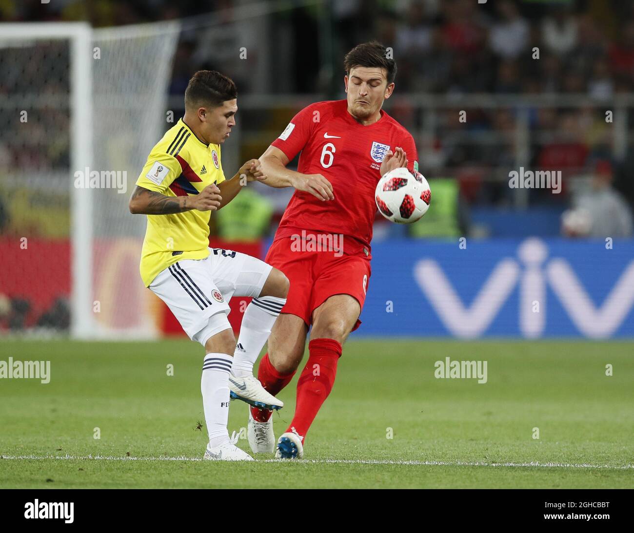 Juan Quintero of Colombia tussles with Harry Maguire of England during the FIFA World Cup 2018 Round of 16 match at the Spartak Stadium, Moscow. Picture date 3rd July 2018. Picture credit should read: David Klein/Sportimage via PA Images Stock Photo