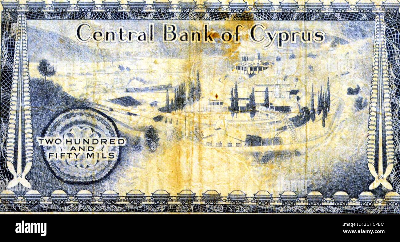 Large part of back side of the 250 Mil banknote Cyprus Year 1978 equals 0.25 Cypriot pounds, non circulating anymore, reverse side features a coal min Stock Photo