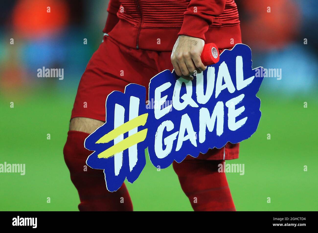 Liverpool's Mohamed Salah holds an Equal Game sign during the UEFA  Champions League match at Anfield Stadium, Liverpool. Picture date 24th  October 2018. Picture credit should read: Matt McNulty/Sportimage via PA  Images