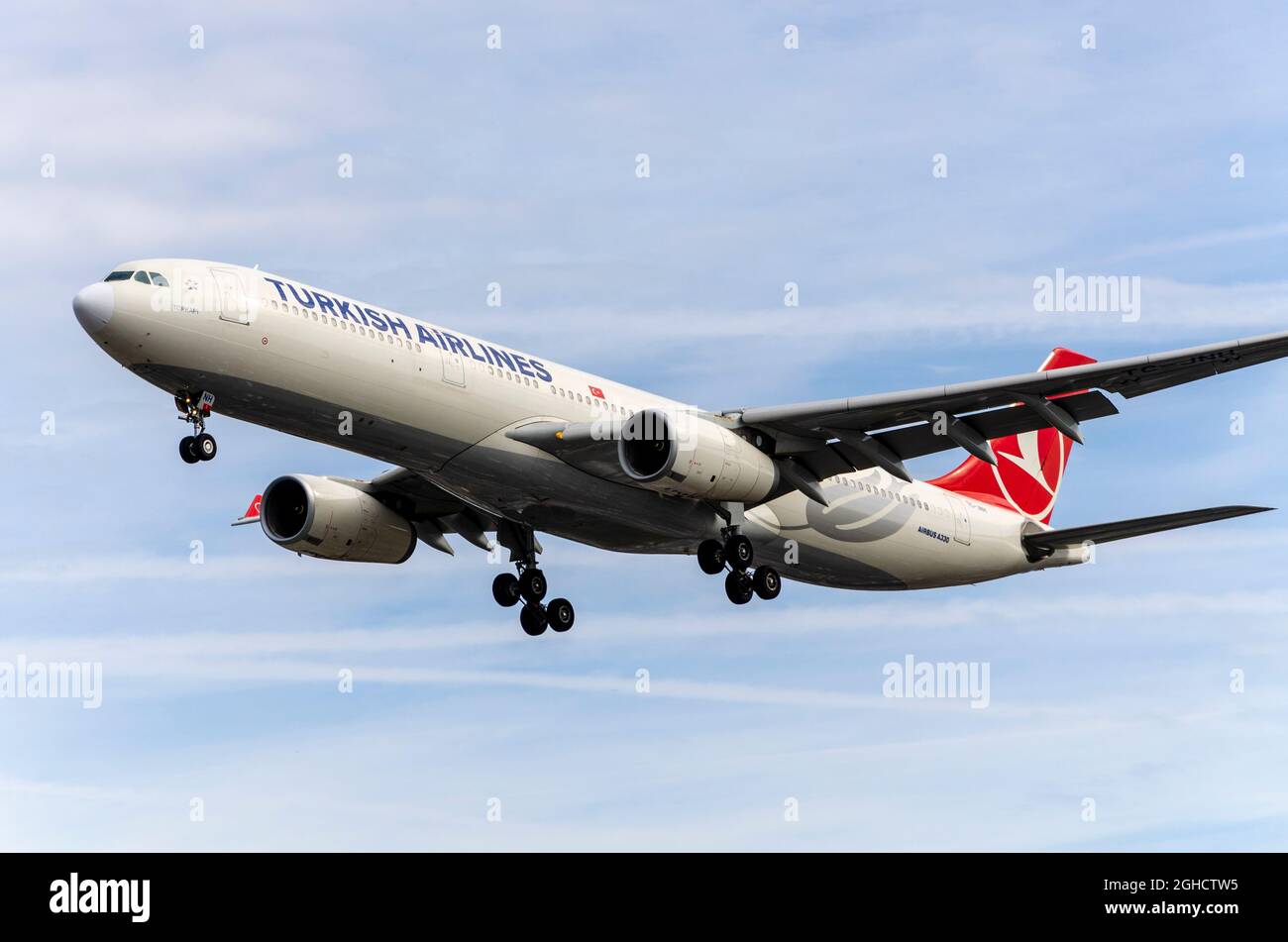 Turkish Airlines Airbus A330 jet airliner plane TC-JNH landing at London Heathrow Airport, UK. Flag carrier airline of Turkey. Airplane on finals Stock Photo