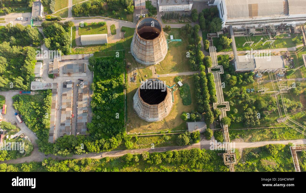 Aerial drone view over thermal power plant. Cooling towers of CHP Stock Photo