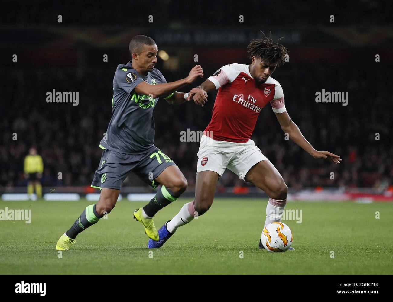Bruno Gaspar of Sporting Lisbon tackles Alex Iwobi of Arsenal during the Europa League, Group E match at the Emirates Stadium, London. Picture date: 8th November 2018. Picture credit should read: David Klein/Sportimage  via PA Images Stock Photo