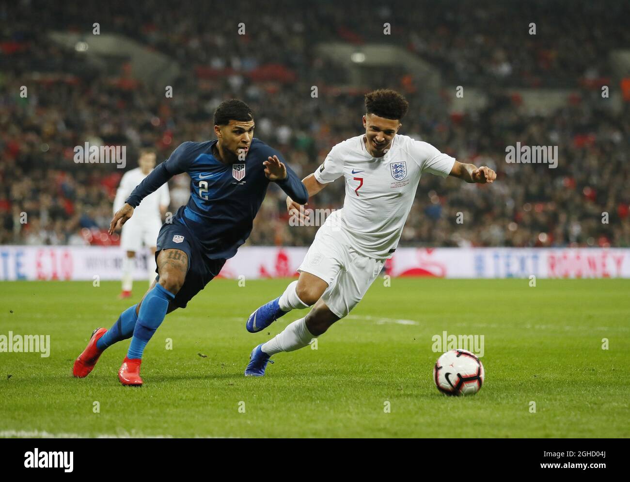 DeAndre Yedlin of USA challenged by Jadon Sancho of England during the Friendly International match at Wembley Stadium, London. Picture date: 15th November 2018. Picture credit should read: David Klein/Sportimage via PA Images Stock Photo