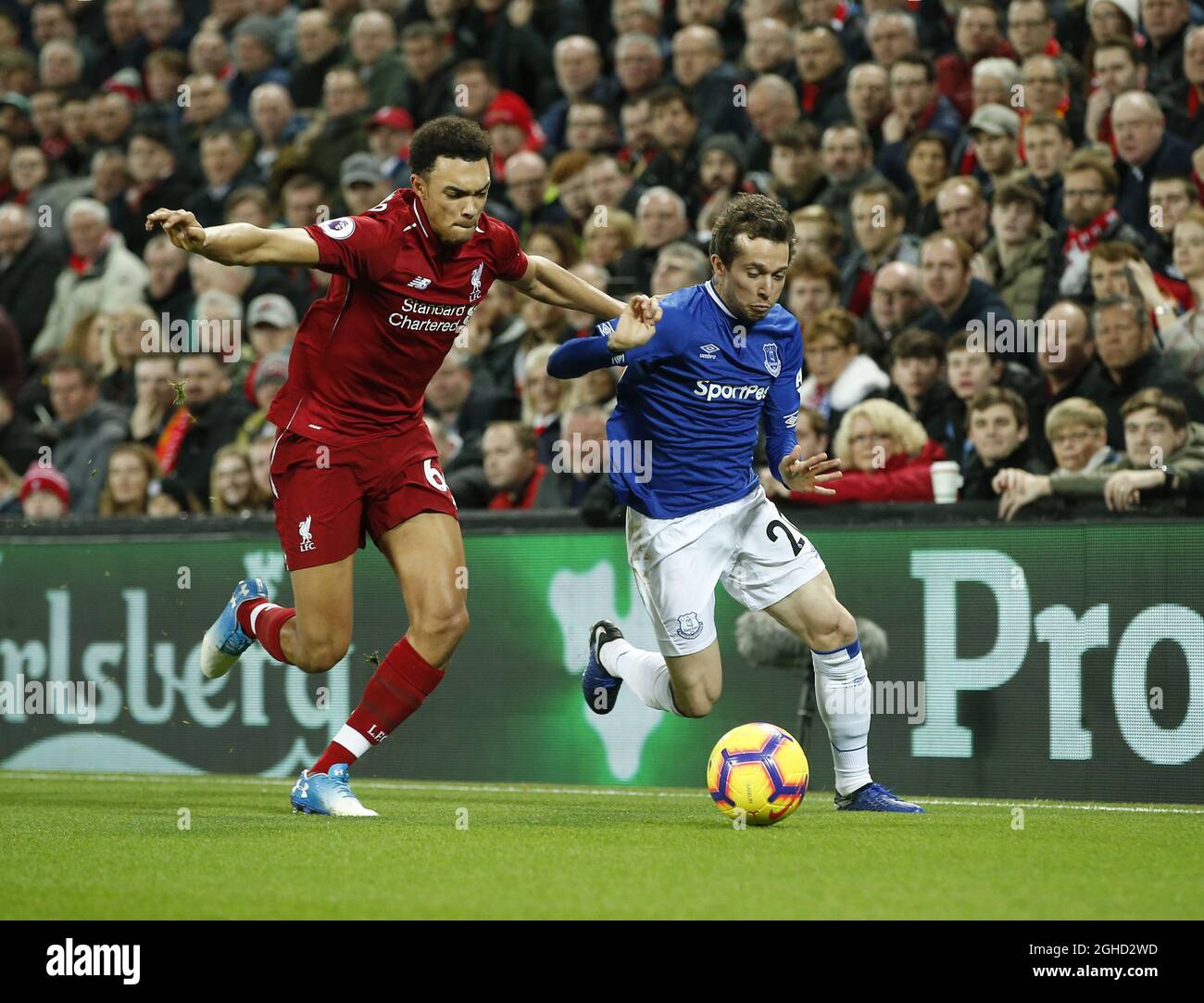 Trent Alexander-Arnold of Liverpool tackles Bernard of Everton during the Premier League match at Anfield Stadium, Liverpool. Picture date 2nd December 2018. Picture credit should read: Andrew Yates/Sportimage via PA Images Stock Photo