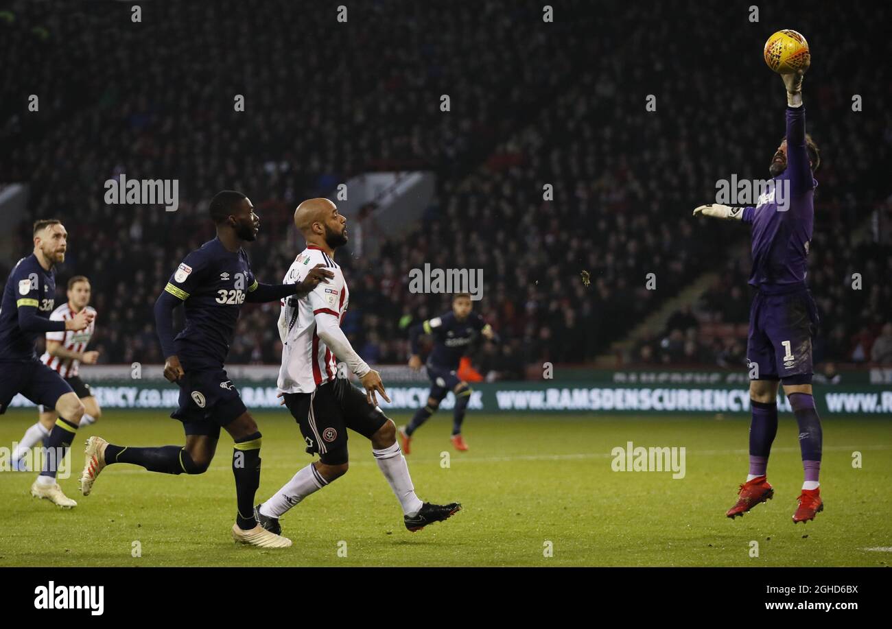 David McGoldrick of Sheffield Utd lobs Scott Carson of Derby County during the Sky Bet Championship match at the Bramall Lane Stadium, Sheffield. Picture date: 26th December 2018. Picture credit should read: Simon Bellis/Sportimage via PA Images Stock Photo