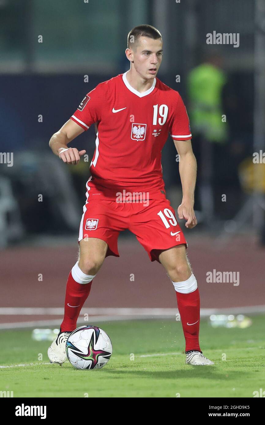 Jeremie FRIMPONG (Bayer 04 Leverkusen, #30) in a duel with Jakub KAMINSKI  (VfL Wolfsburg, #16), Stock Photo, Picture And Rights Managed Image. Pic.  PAH-321123917