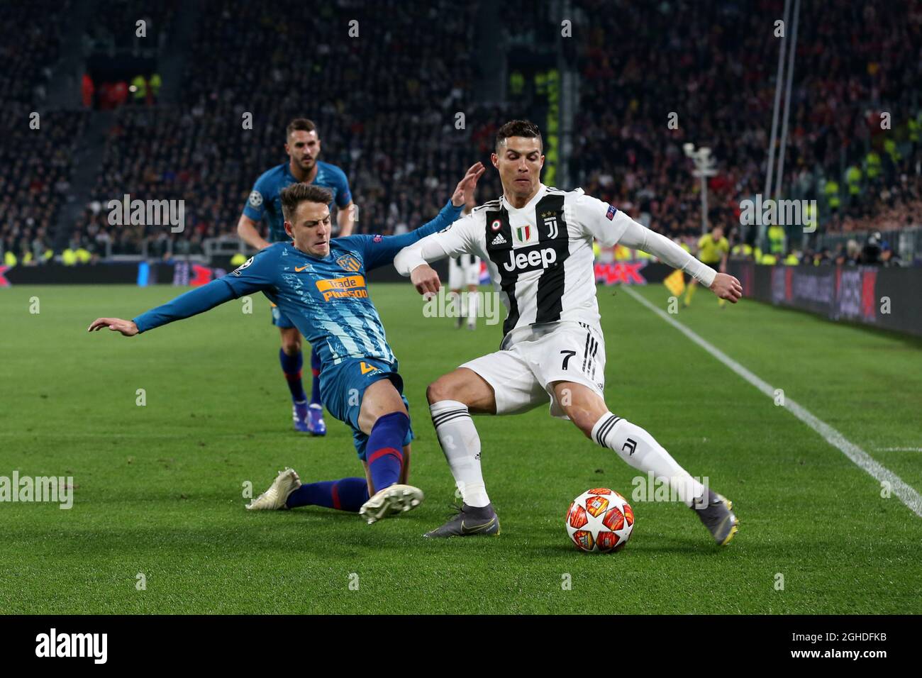 Cristiano Ronaldo of Juventus and Santiago Arias of Atletico Madrid during the UEFA Champions League Round of 16 match at the Allianz Stadium, Turin, Italy. Picture date 12th March 2019. Picture credit should read: Jonathan Moscrop/Sportimage via PA Images Stock Photo