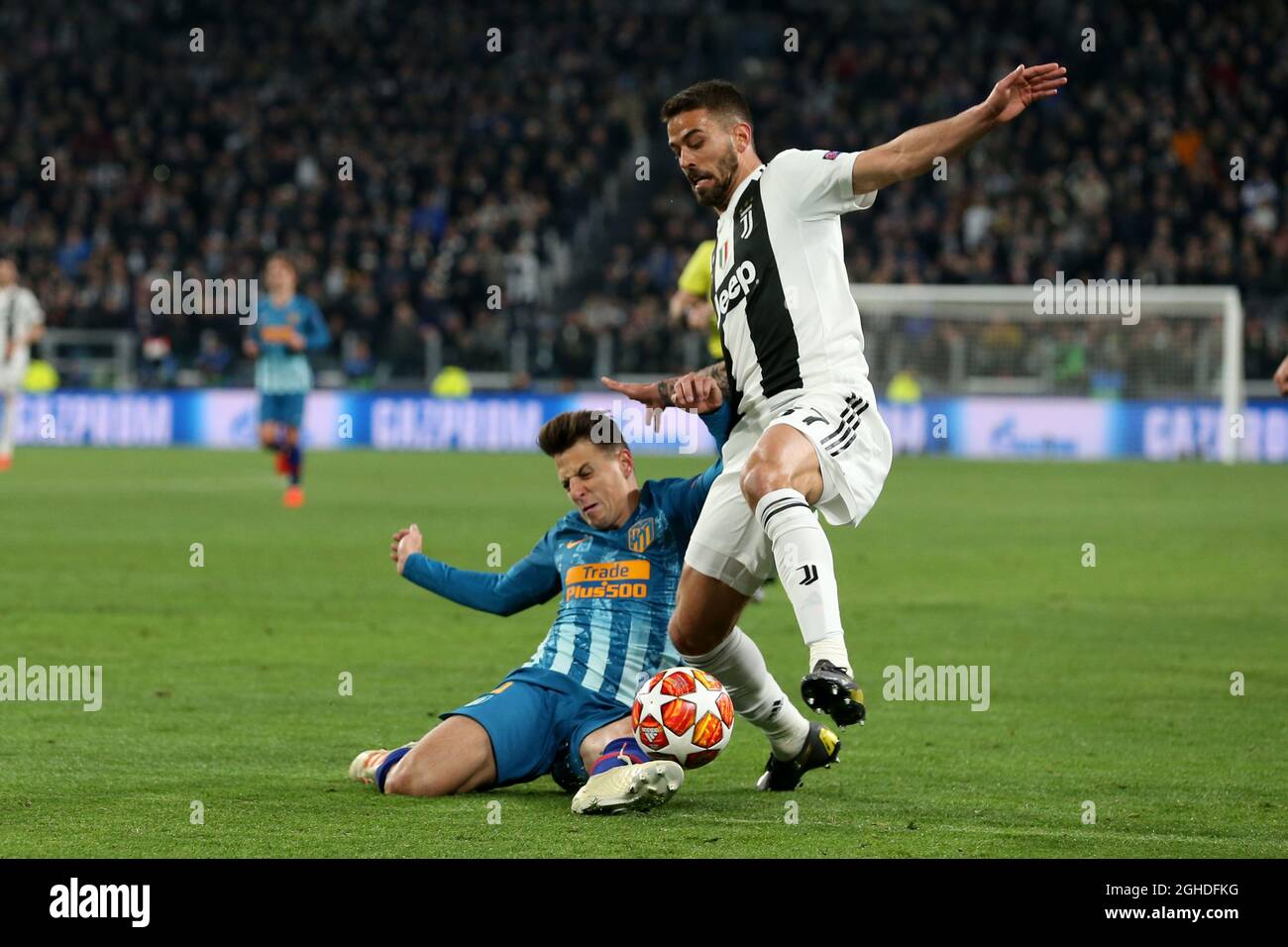 Leonardo Spinazzola of Juventus and Santiago Arias of Atletico Madrid during the UEFA Champions League Round of 16 match at the Allianz Stadium, Turin, Italy. Picture date 12th March 2019. Picture credit should read: Jonathan Moscrop/Sportimage via PA Images Stock Photo