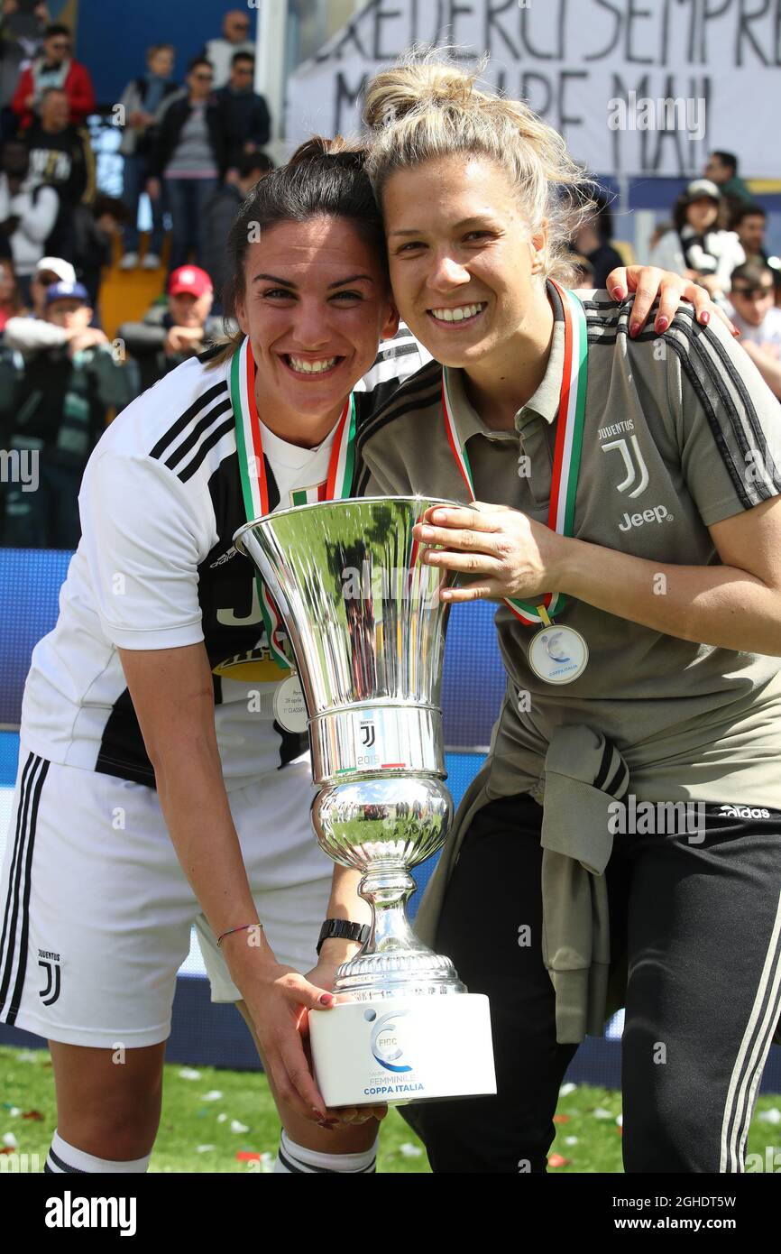 Michela Franco and Federica Russo of Juventus celebrate with the trophy after the final whistle of the Coppa Italia Final at Ennio Tardini Stadium, Parma . Picture date: 28th April 2019. Picture credit should read: Jonathan Moscrop/Sportimage via PA Images Stock Photo