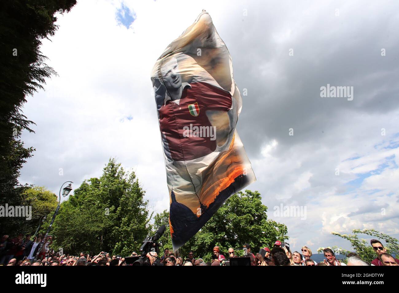 A giant flag is waved depicting the Cathedral of Superga of Grande Torino captain Valentino Mazzola during the memorial service for the victims of the Superga Air disaster at the Superga Cathedral, Turin. Picture date: 4th May 2019. Picture credit should read: Jonathan Moscrop/Sportimage via PA Images Stock Photo