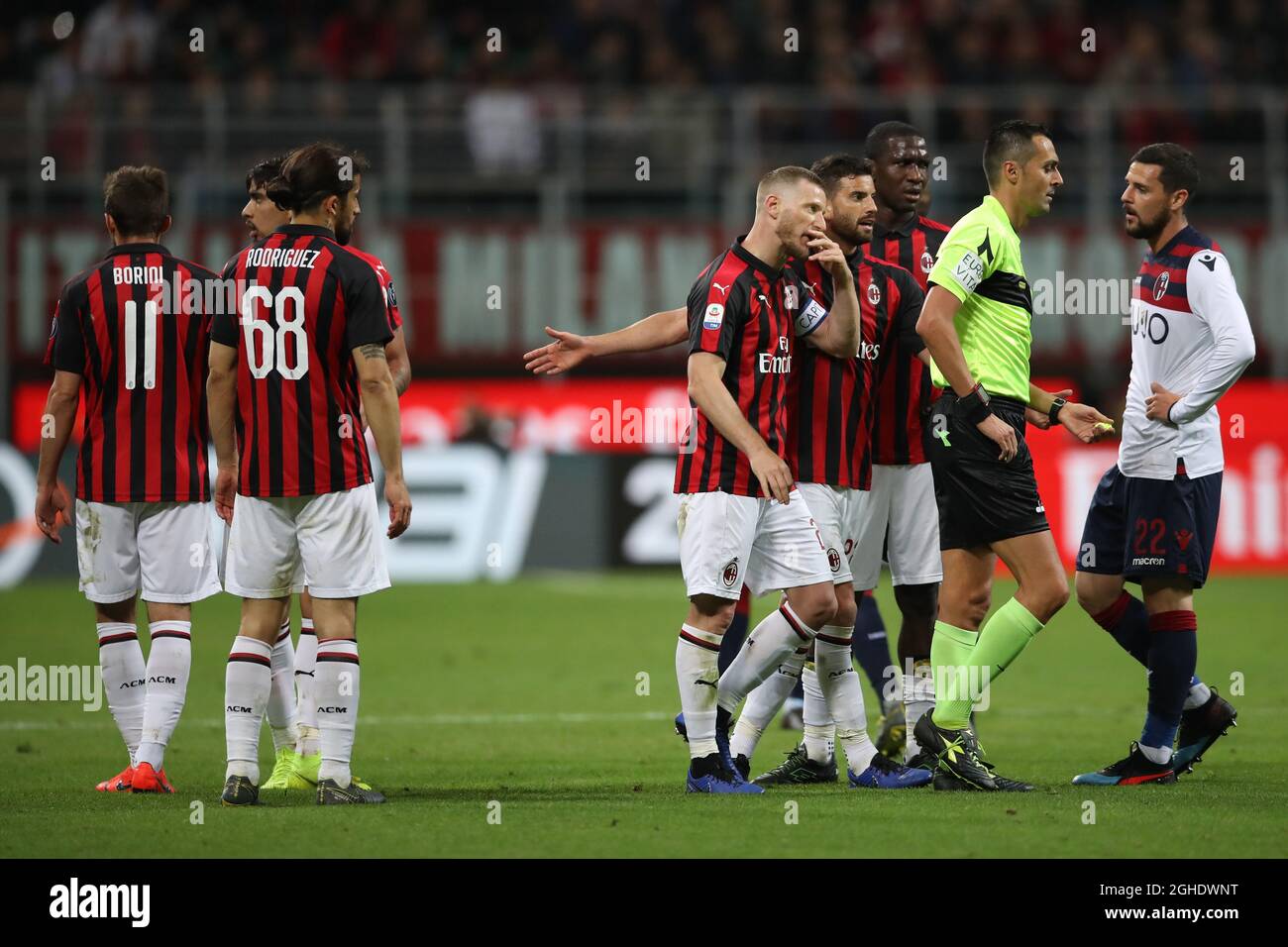 AC Milan players continue to protest to the referee Marco Di Bello about  the sending off of Lucas Paqueta during the Serie A match at Giuseppe  Meazza, Milan. Picture date: 6th May