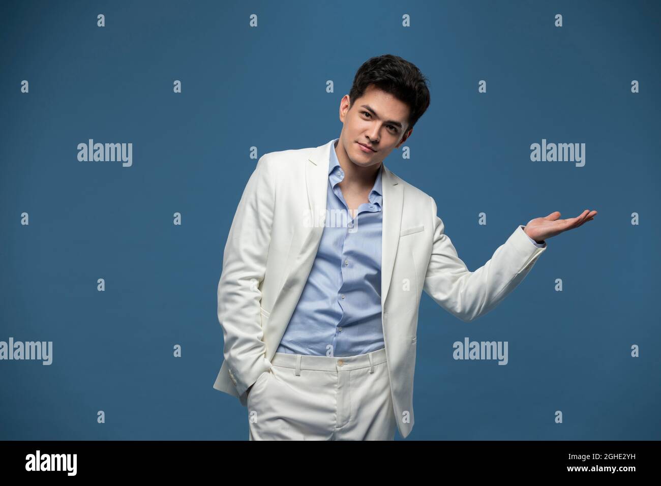 Studio shot of fashionable young man Stock Photo - Alamy