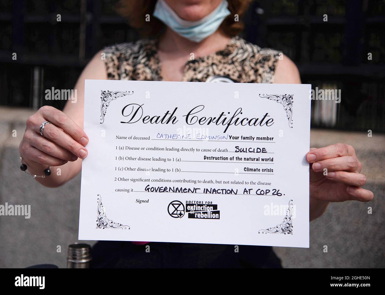 Death Certificate Uk Hi Res Stock Photography And Images Alamy   London Uk 06th Sep 2021 An Activist Holds A Fake Death Certificate With The Cause Of Death Being Government Inaction During The Demonstration The Self Organizing Group Westminster Rebellion Organised A Welcome Back To Parliament And A Die In At The Houses Of Parliament In London To Welcome Mps Back After Their Summer Recess And Remind Them That Westminster Rebellion Have Not Gone Away And Neither Has The Climate And Ecological Emergency And The Need For Cop26 And Forthcoming Legislation To Be Taken Seriously Credit Sopa Images Limitedalamy Live News 2GHE50N 