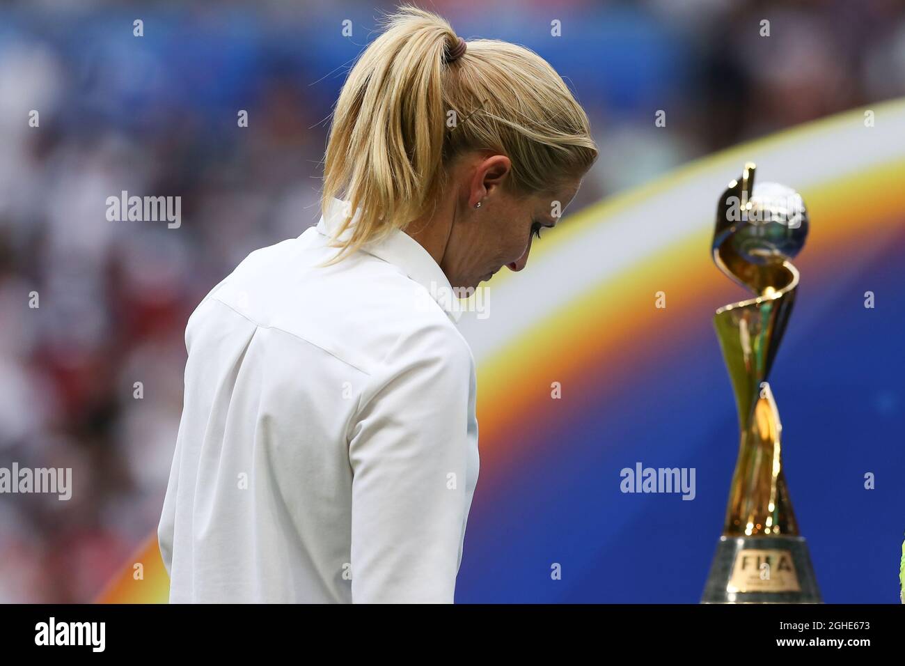 Sarina Wiegman manager of Holland passes in front of the trophy with her head bowed after the final whistle during the FIFA Women's World Cup match at Stade de Lyon, Lyon. Picture date: 7th July 2019. Picture credit should read: Jonathan Moscrop/Sportimage via PA Images Stock Photo
