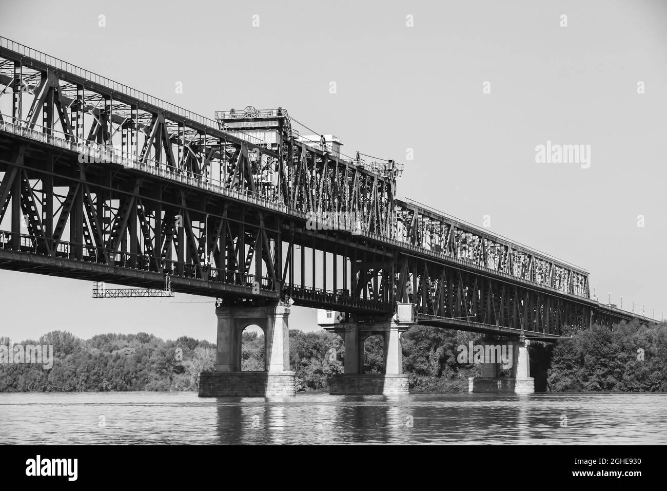 Black and white photo of Danube Bridge. A truss bridge over the Danube River connecting Bulgarian and Romanian banks Stock Photo