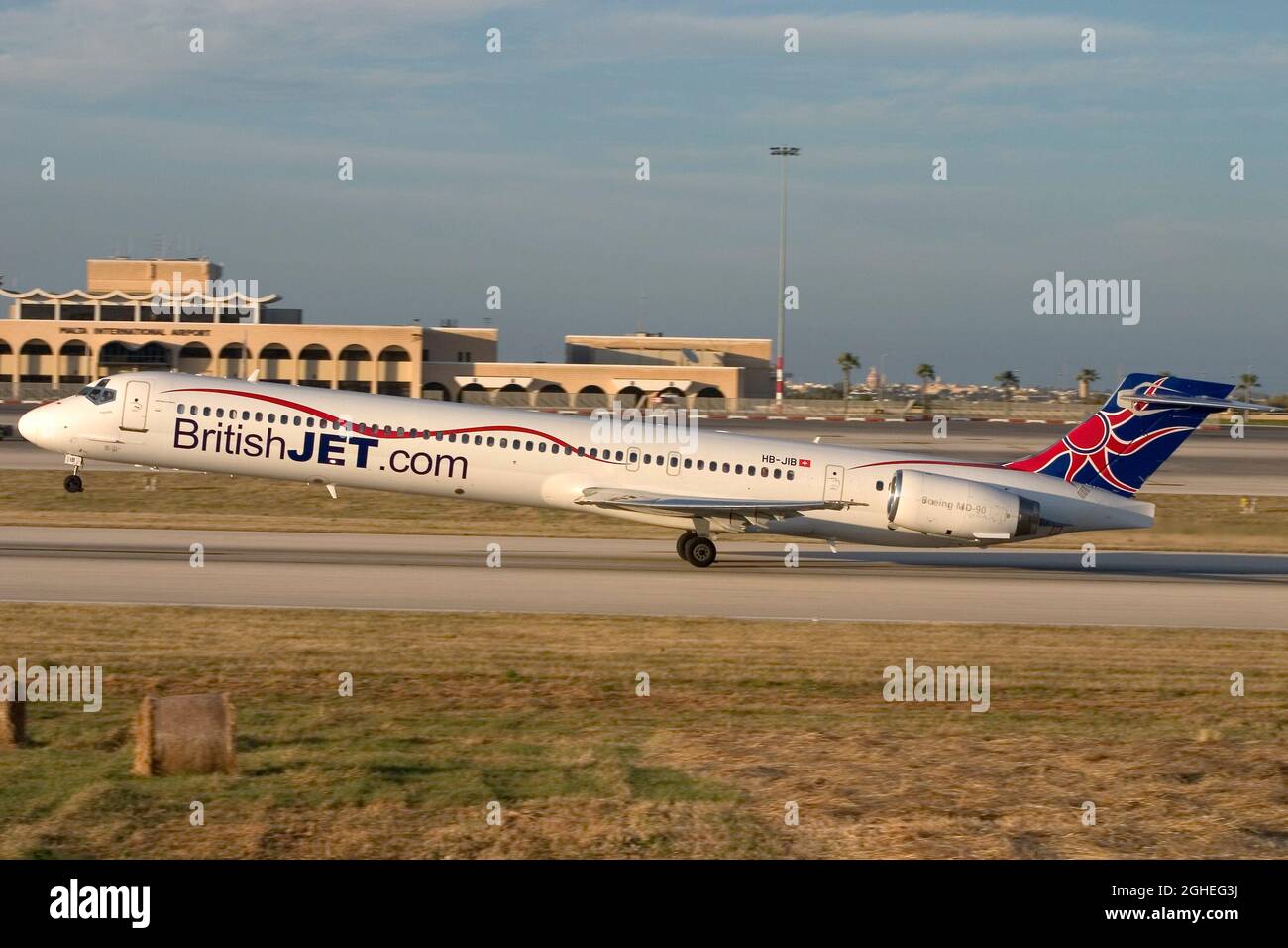 BritishJet (Hello) McDonnell Douglas MD-90-30 [HB-JIB] taking off from runway 32. BritshJet was a short lived low-cost airline operating Malta-UK flig Stock Photo