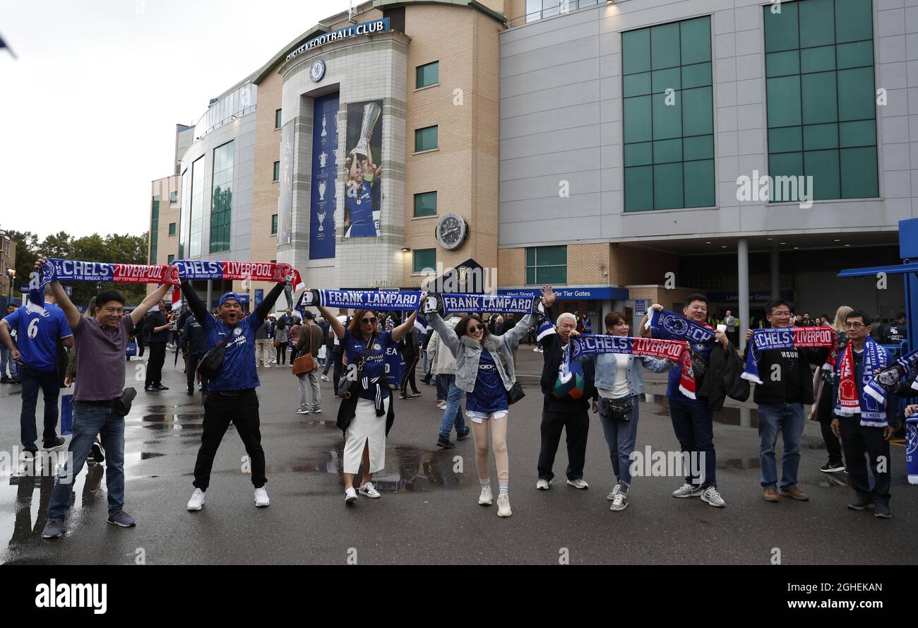 Supporters pose for pictures outside the ground during the Premier League match at Stamford Bridge, London. Picture date: 22nd September 2019. Picture credit should read: Darren Staples/Sportimage via PA Images Stock Photo