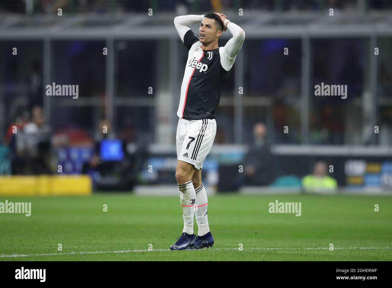 Cristiano Ronaldo of Juventus reacts after hitting the crossbar with a  first half effort during the Serie A match at Giuseppe Meazza, Milan.  Picture date: 6th October 2019. Picture credit should read: