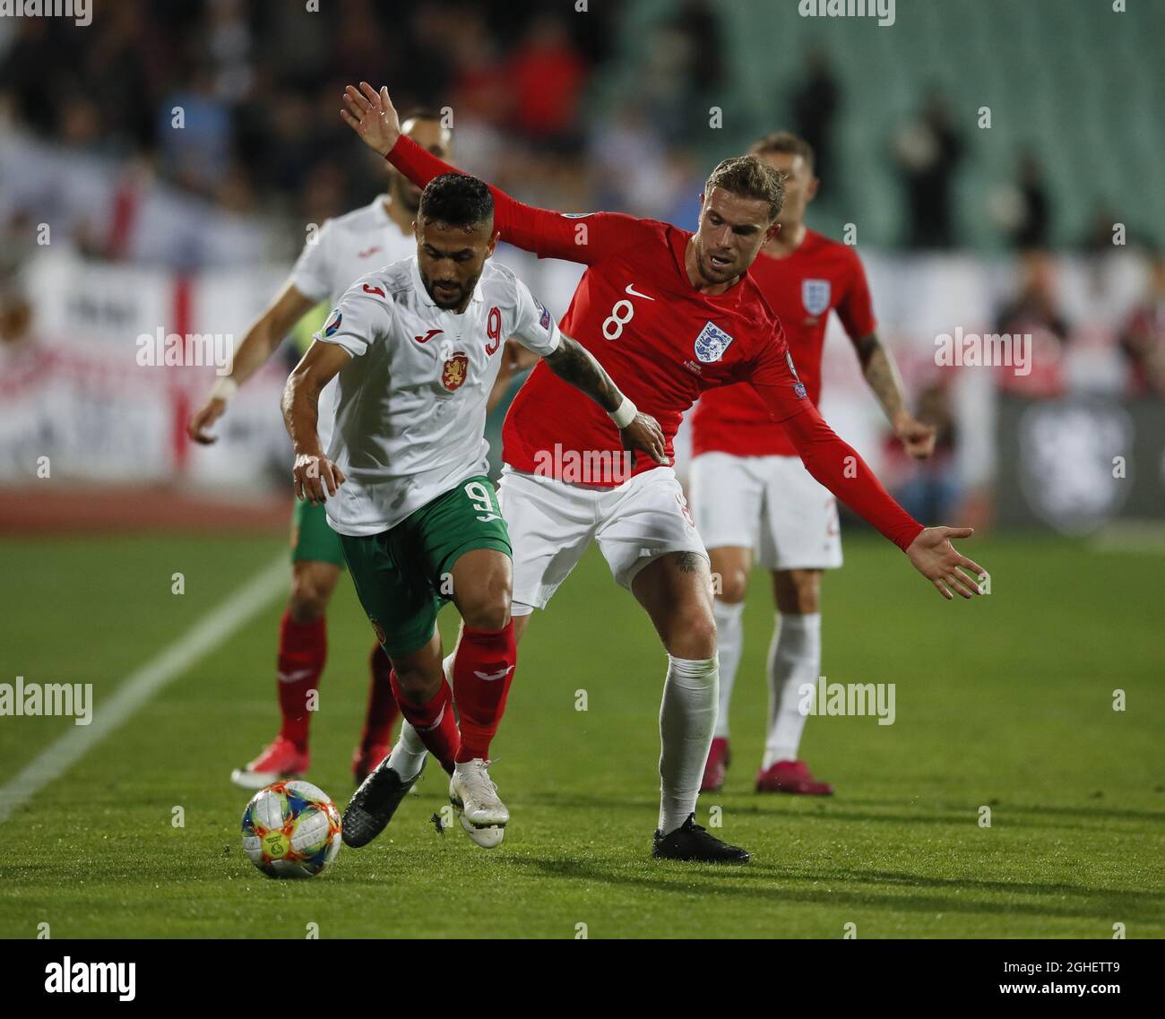Wanderson of Bulgaria with Jordan Henderson of England during the UEFA Euro 2020 Qualifying match at the Vasil Levski National Stadium, Sofia. Picture date: 14th October 2019. Picture credit should read: David Klein/Sportimage via PA Images Stock Photo