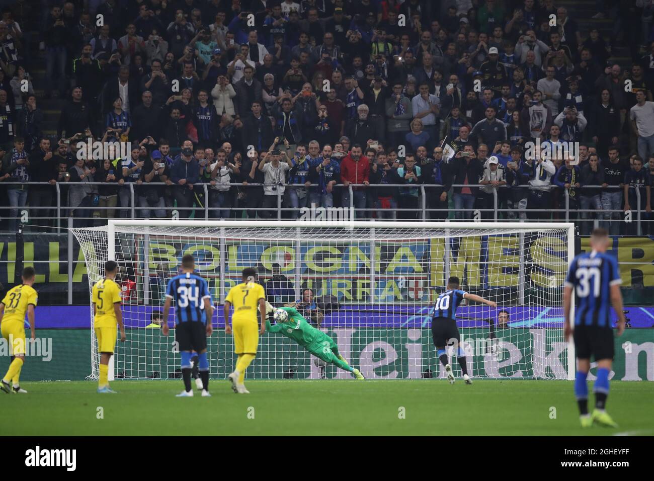 Roman Burki of Borussia Dortmund saves a penalty from Lautaro Martinez of Inter during the UEFA Champions League match at Giuseppe Meazza, Milan. Picture date: 23rd October 2019. Picture credit should read: Jonathan Moscrop/Sportimage via PA Images Stock Photo