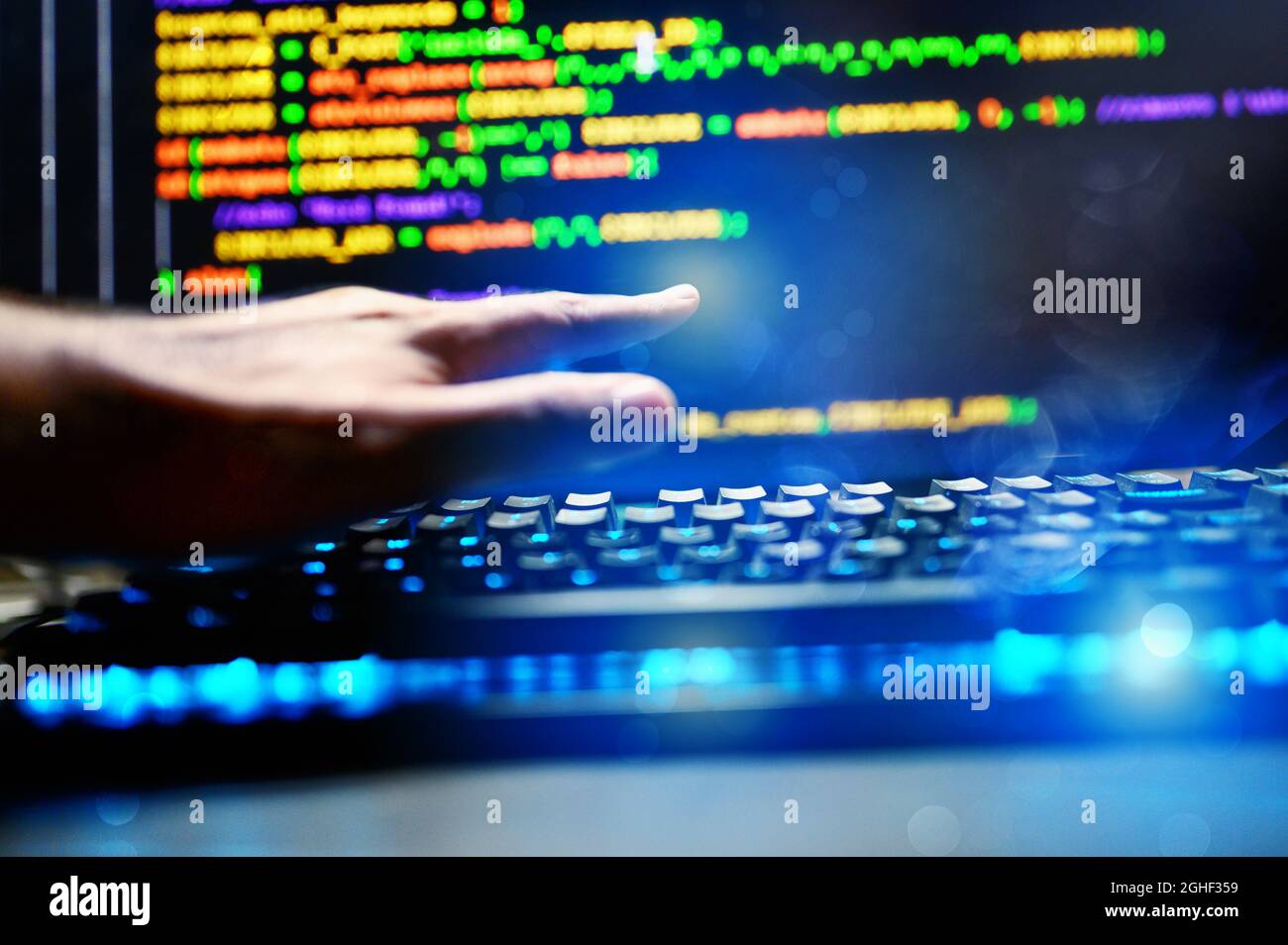 Computer of a programmer with lines code of software Stock Photo - Alamy