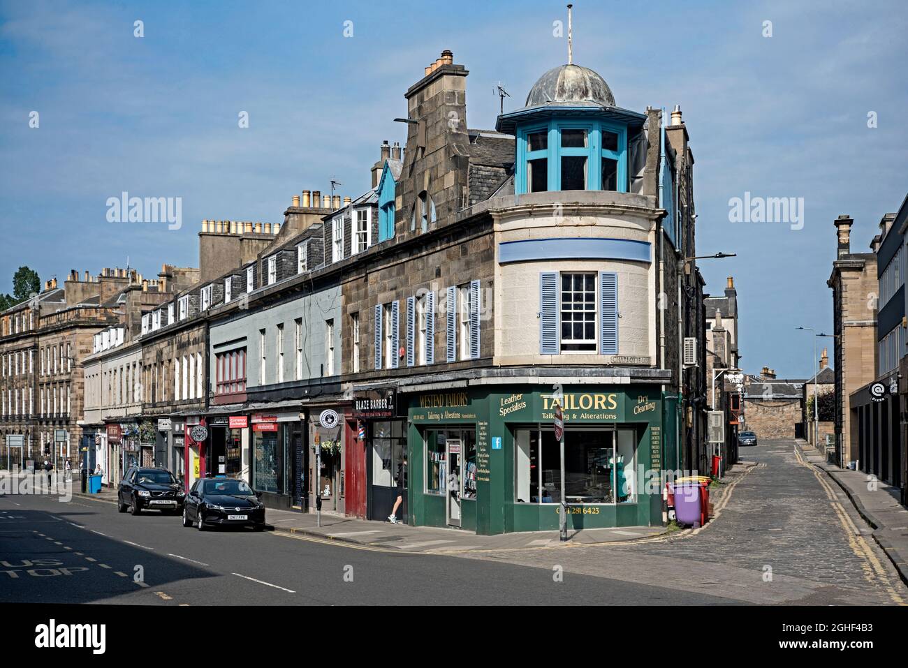 Row of small shops in Queensferry Street in Edinburgh's West End. Stock Photo