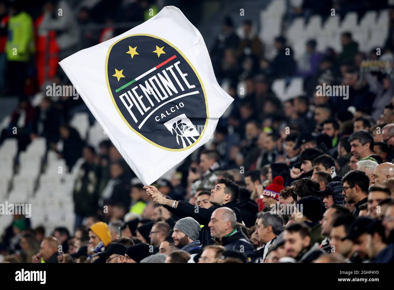 A fan waves a flag with the words Piemonte Calcio, the name Juventus are know as on FIFA2019 due to a sponsorship deal with PES2019 during the Serie A match at Allianz Stadium, Turin. Picture date: 10th November 2019. Picture credit should read: Jonathan Moscrop/Sportimage via PA Images Stock Photo