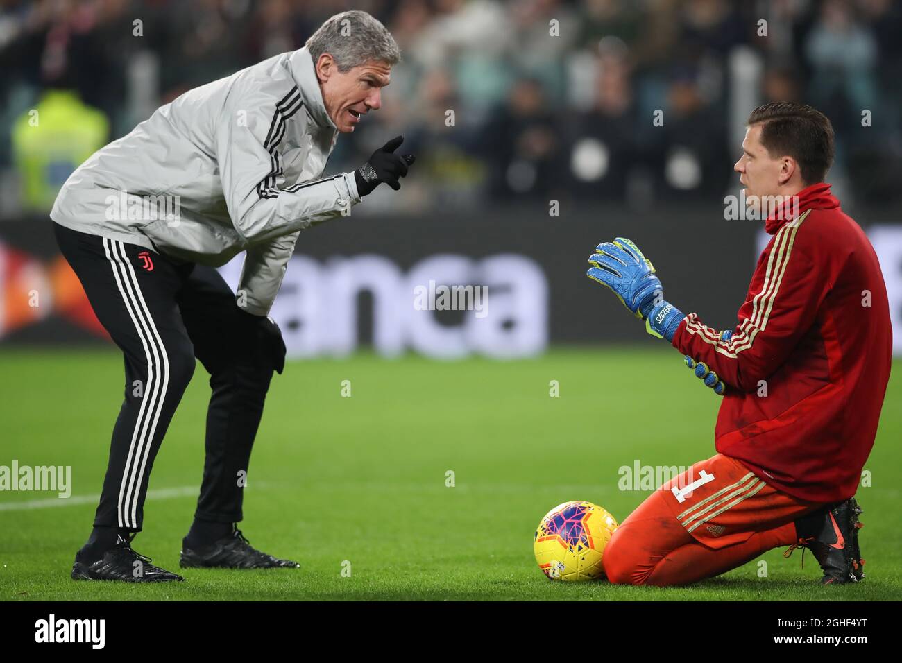 Juventus goalkeeping coach Claudio Filippi speaks with Wojciech Szczesny before the Serie A match at Allianz Stadium, Turin. Picture date: 10th November 2019. Picture credit should read: Jonathan Moscrop/Sportimage via PA Images Stock Photo