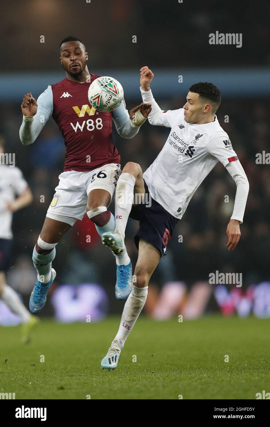 Jonathan Kodjia of Aston Villa tackled by Isaac Christie-Davies of Liverpool during the Carabao Cup Quarter-Final match at Villa Park, Birmingham. Picture date: 17th December 2019. Picture credit should read: Darren Staples/Sportimage via PA Images Stock Photo