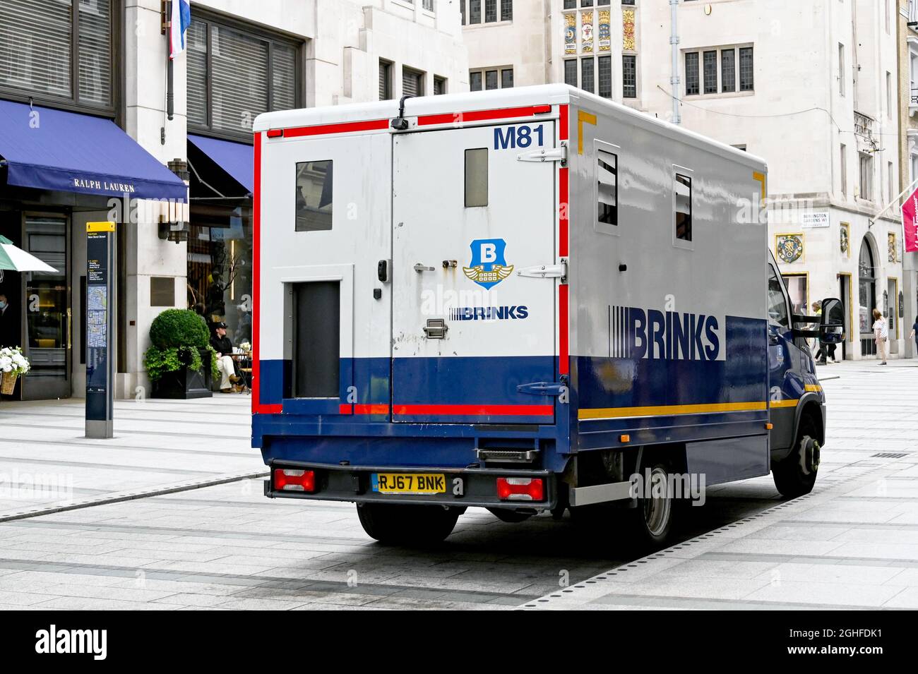 London, England - August 2021: Security van operated by Brinks parked on New Bond Street in central London Stock Photo
