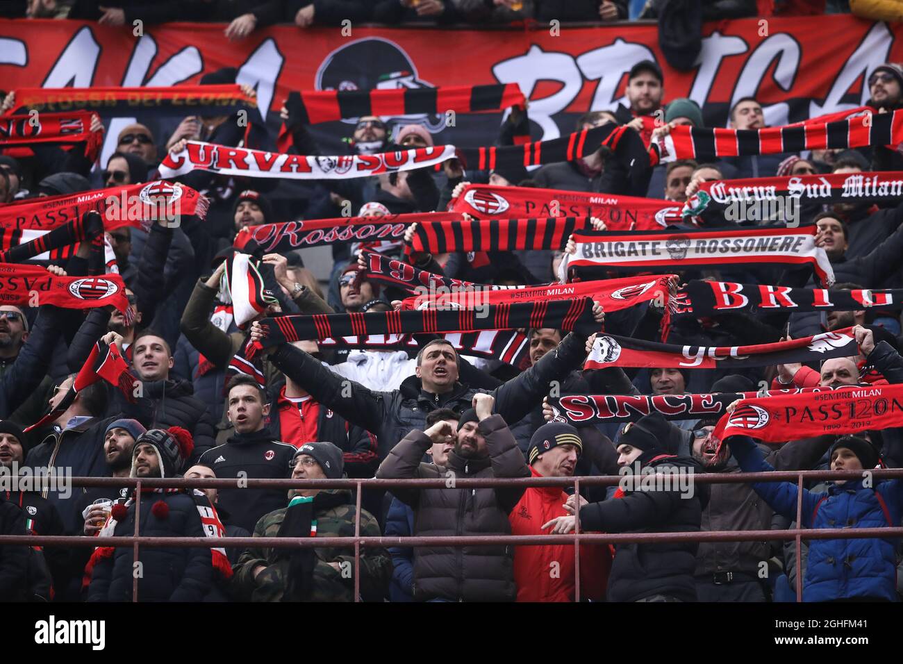 Milan Fans AC Milan fans wave flags and hold up scarves during the Serie A match ...