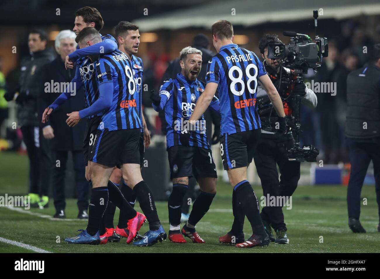 Mario Pasalic of Atalanta celebrates with team mate Alejandro Gomez barely seconds after coming on as a substitute to give the side a 2-1 lead during the Serie A match at Gewiss Stadium, Bergamo. Picture date: 15th February 2020. Picture credit should read: Jonathan Moscrop/Sportimage via PA Images Stock Photo