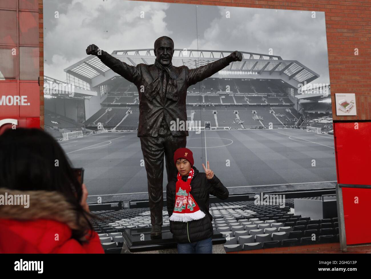 Fans pose for pictures before the Premier League match at Anfield, Liverpool. Picture date: 24th February 2020. Picture credit should read: Darren Staples/Sportimage via PA Images Stock Photo