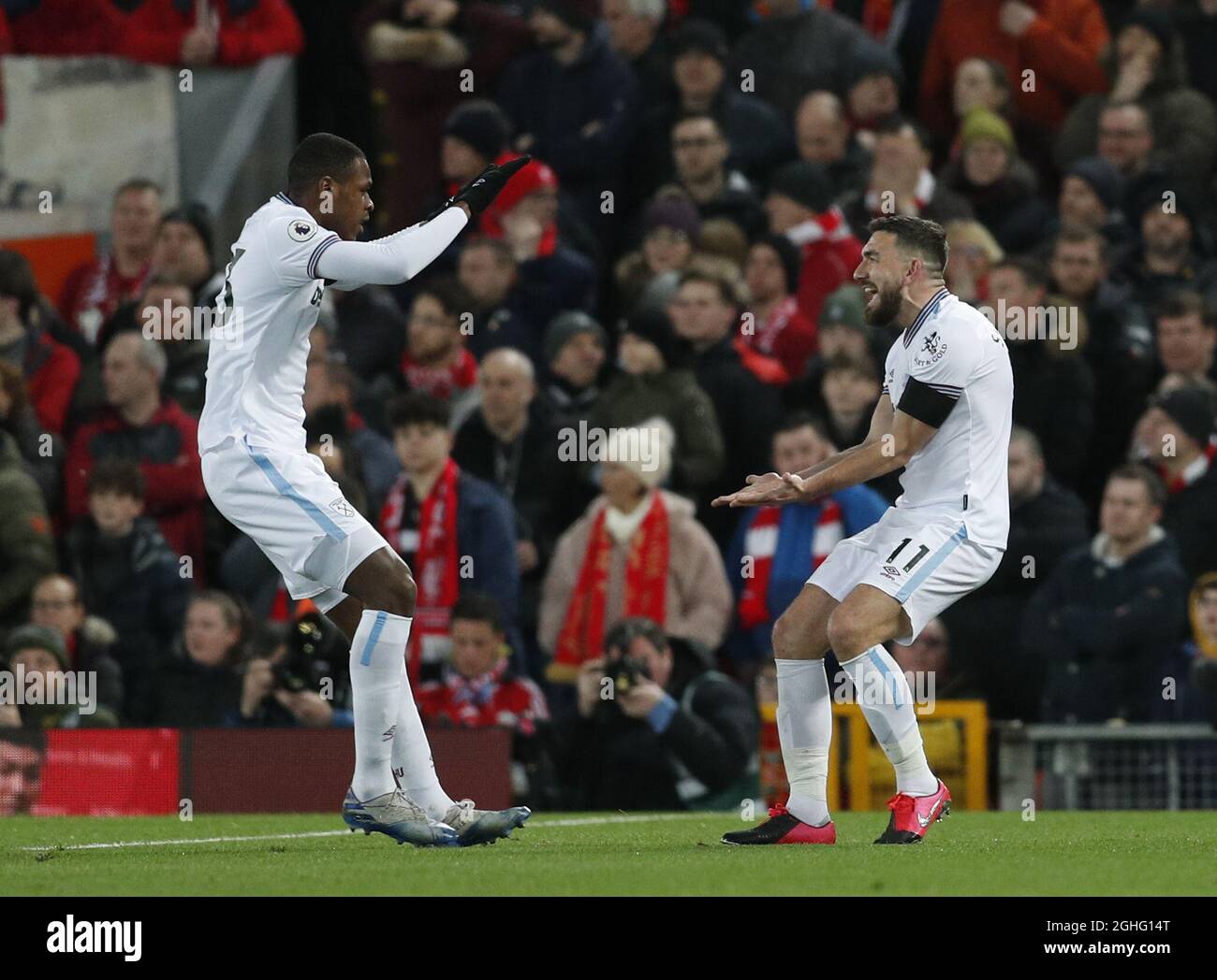 Issa Diop of West Ham United (l) celebrates scoring the equaliser with Robert Snodgrass of West Ham United  during the Premier League match at Anfield, Liverpool. Picture date: 24th February 2020. Picture credit should read: Darren Staples/Sportimage via PA Images Stock Photo