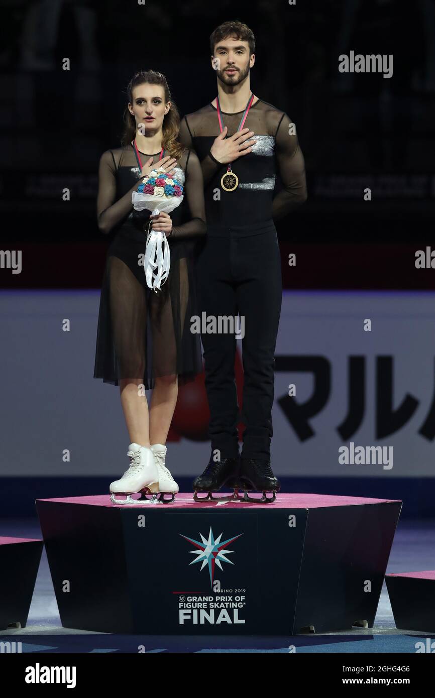 The Senior Ice Dance Gold medal winners Gabriella Papadakis and Guillaume Cizeron of France pictured on the medalists podium at Palavela, Turin. Picture date: 7th December 2019. Picture credit should read: Jonathan Moscrop/Sportimage via PA Images Stock Photo