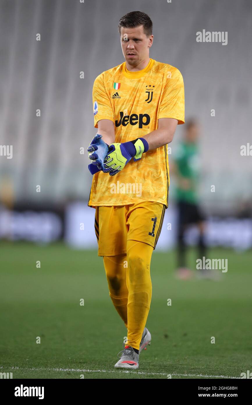 Polish goalkeeper Wojciech Szczesny of Juventus pulls on his gloves at the  start of the Serie A match at Allianz Stadium, Turin. Picture date: 11th  July 2020. Picture credit should read: Jonathan