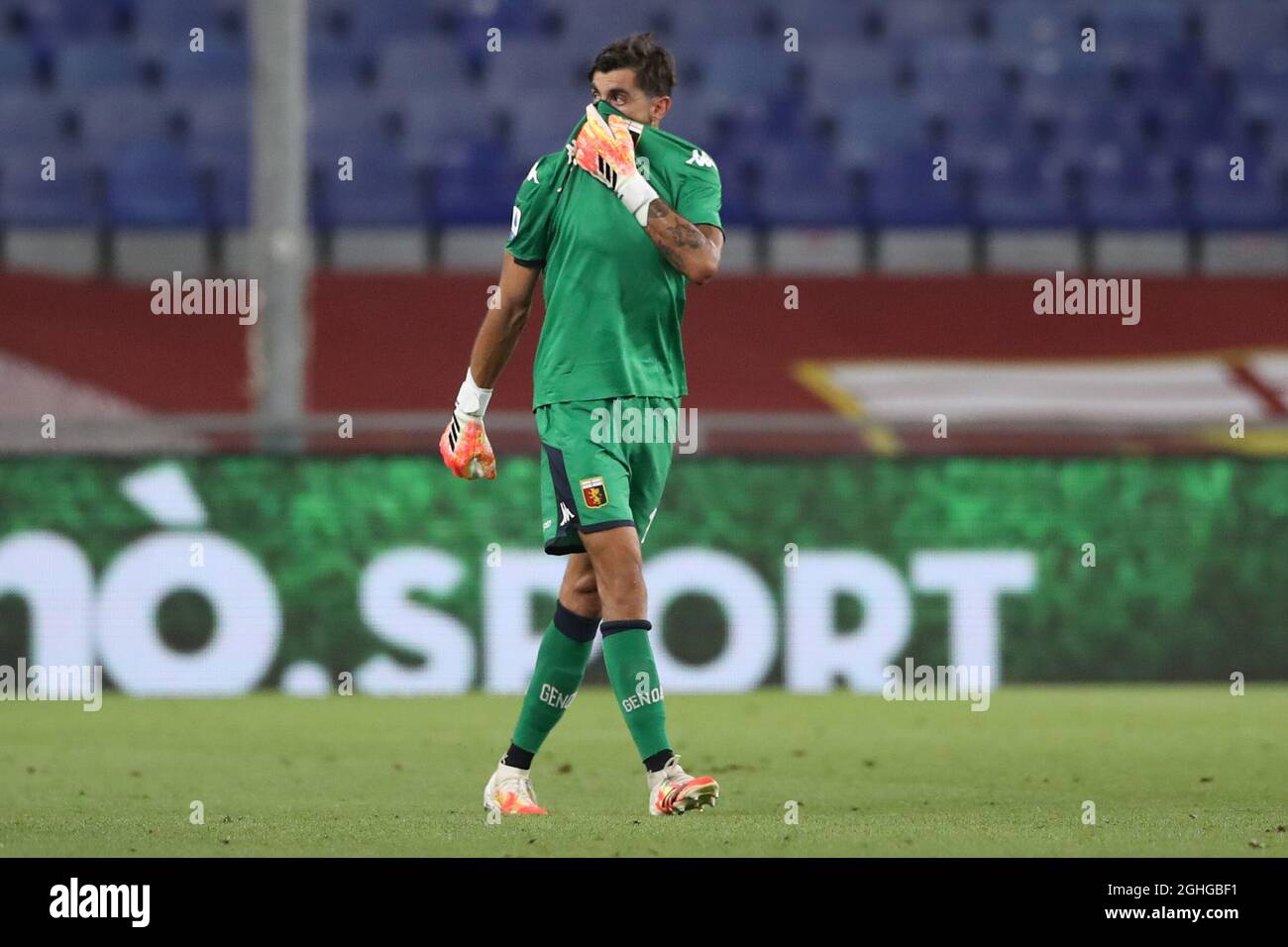 Mattia Perin reascts as Matteo Pessina of Hellas Verona receives medical attention after dislocating his patella in a challenge with Cristian Romero of Genoa CFC whom was subsequently shown a yellow card by referee Massimiliano Irrati during the Serie A match at Luigi Ferraris, Genoa. Picture date: 2nd August 2020. Picture credit should read: Jonathan Moscrop/Sportimage via PA Images Stock Photo