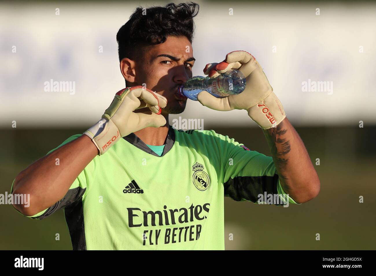Luis Lopez of Real Madrid drinks water from a plastic bottle during the UEFA Youth League match at Colovray Sports Centre, Nyon. Picture date: 22nd August 2020. Picture credit should read: Jonathan Moscrop/Sportimage via PA Images Stock Photo