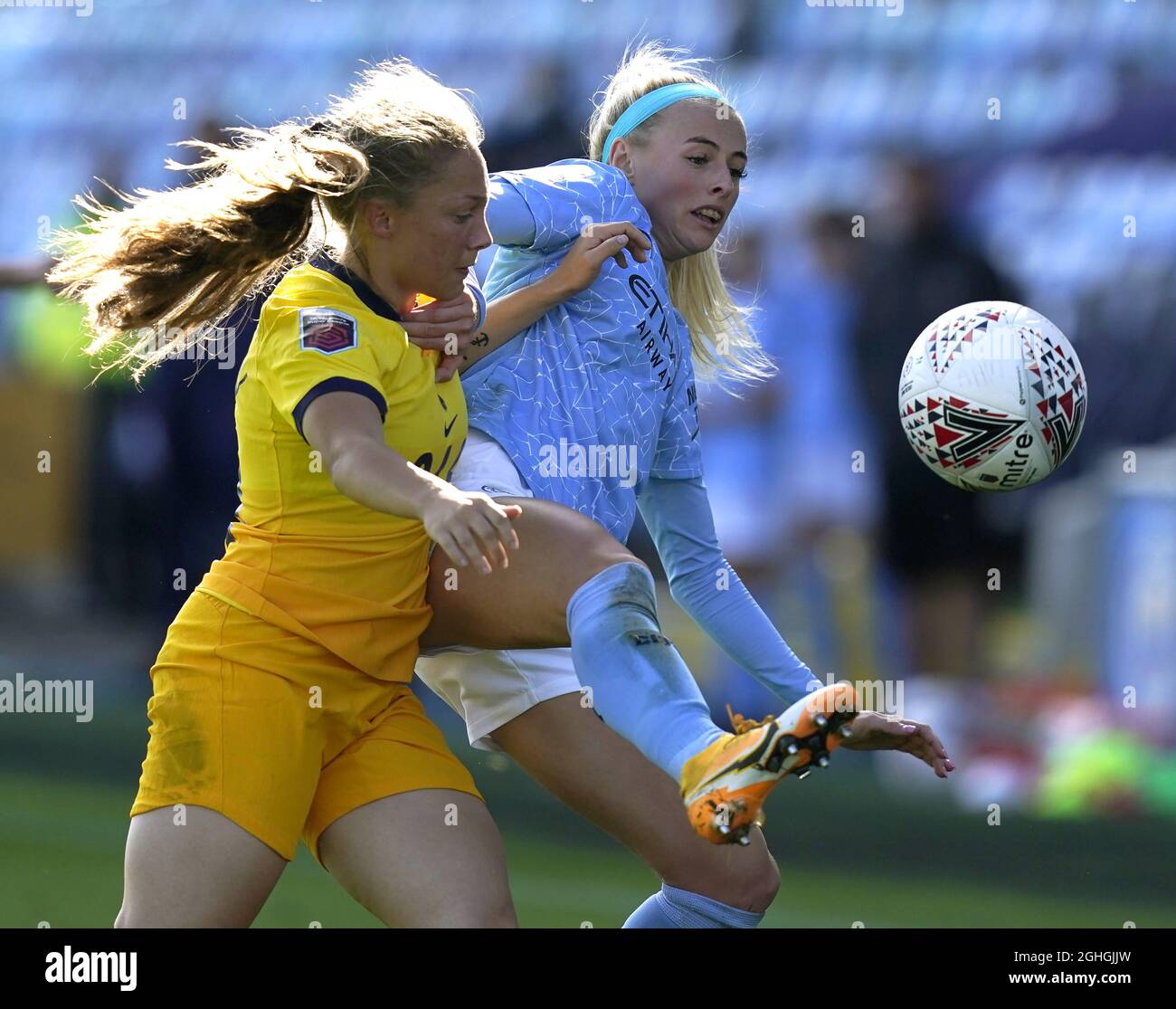 Chloe Kelly of Manchester City (R) holds off Angela Addison of Tottenham Hotspur during the The FA WomenÕs Super League match at Manchester City Academy Stadium, Manchester. Picture date: 4th October 2020. Picture credit should read: Andrew Yates/Sportimage via PA Images Stock Photo