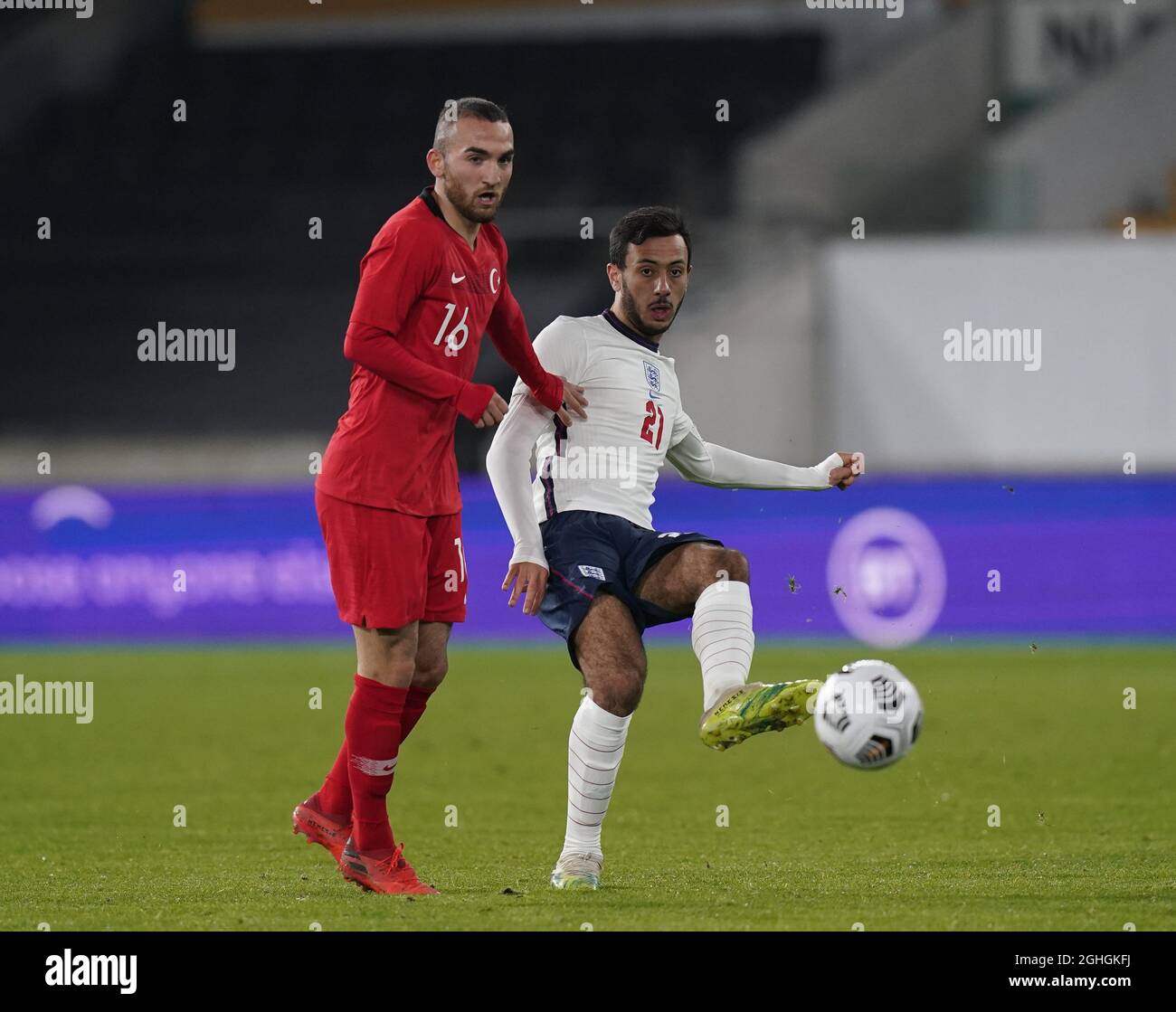 Dwight Marshall of England and  Erkan Eyibil of Turkey during the UEFA Euro U21 Qualifying match at Molineux, Wolverhampton. Picture date: 13th October 2020. Picture credit should read: Andrew Yates/Sportimage via PA Images Stock Photo